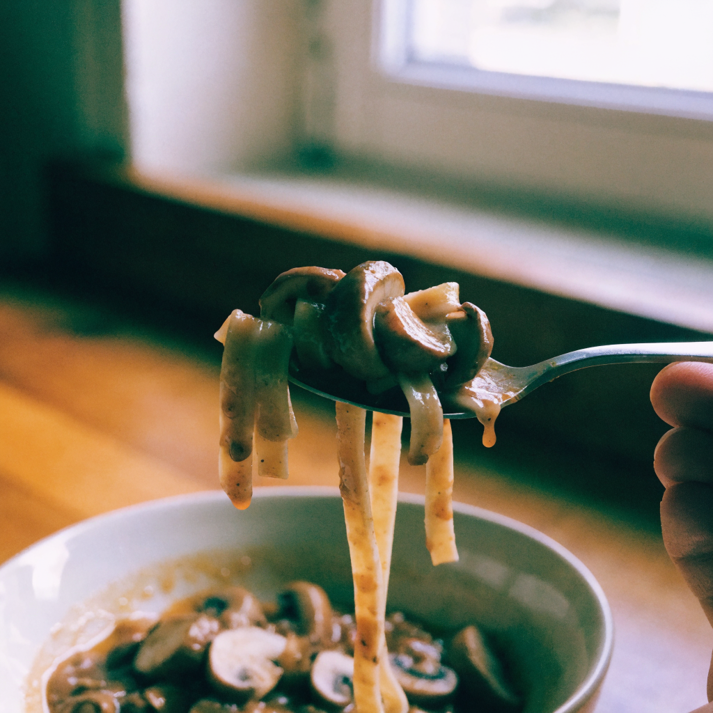 Close-up of hearty mushroom ragu (vegetarian dinner sauce)